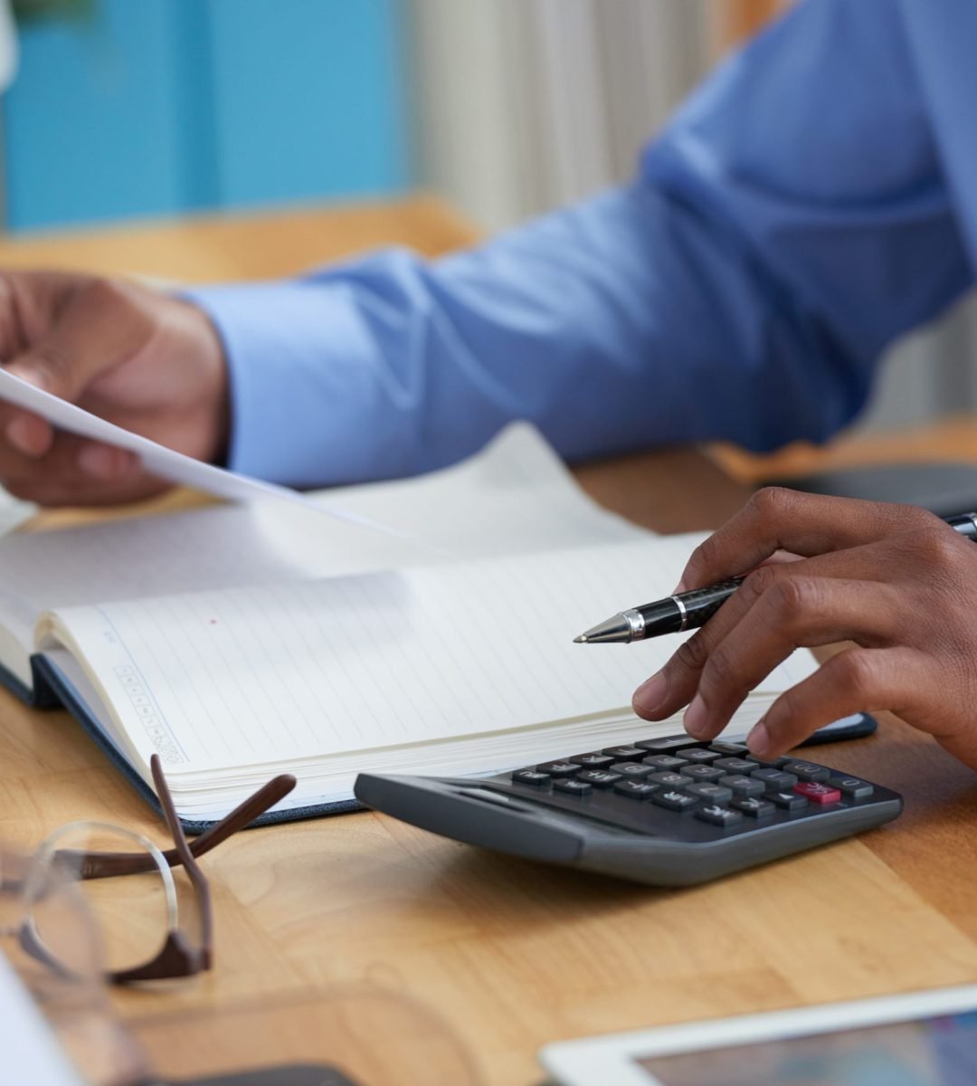 Working on financial report Close-up image of financial managers working with reports